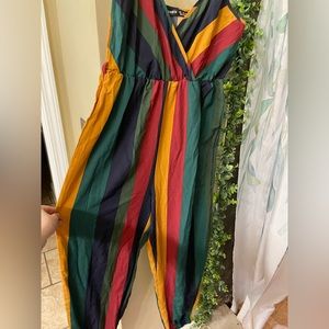 super cute colorful jumper. Size small, never worn